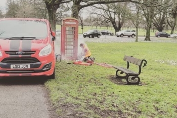 Phone box being uplifted from Stray off Otley Road